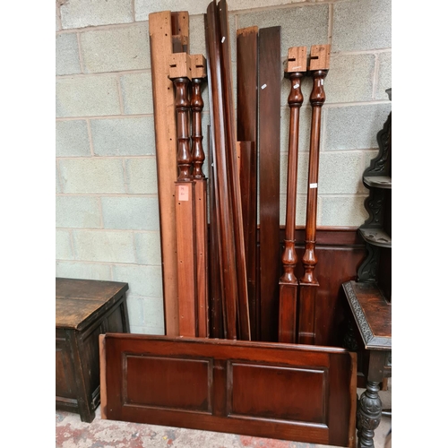 491 - A mahogany four poster double bed frame