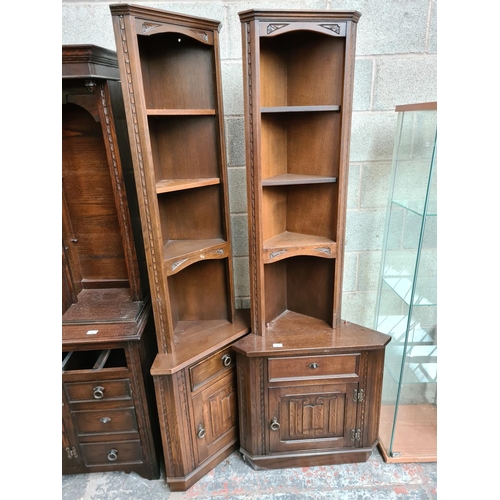 494 - A pair of Jaycee oak freestanding corner cabinets (see condition report)