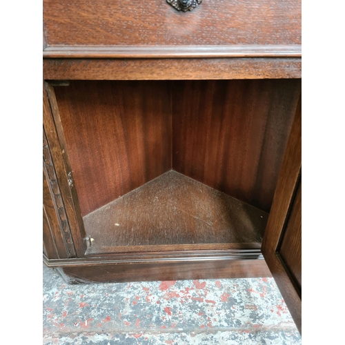 494 - A pair of Jaycee oak freestanding corner cabinets (see condition report)