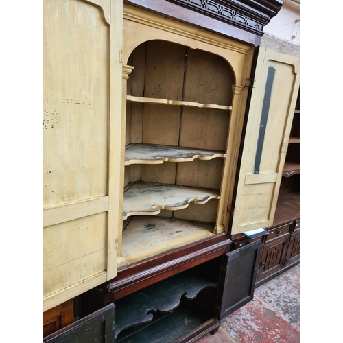 497 - A George III oak flat front corner cabinet with two upper doors, three internal shelves, two lower d... 