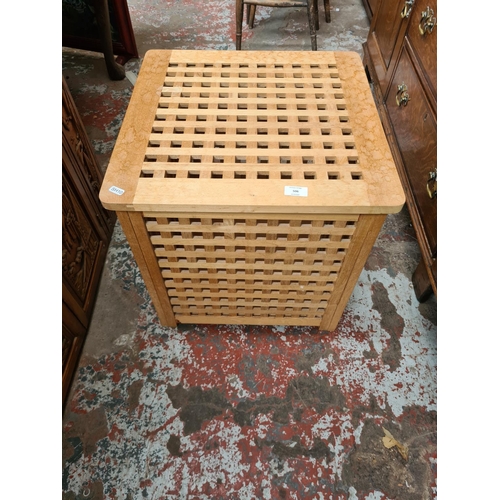 506 - A modern beech laundry basket (see condition report)