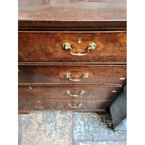 525 - A George III mahogany chest of two short over three long drawers with brass swan neck handles and br... 