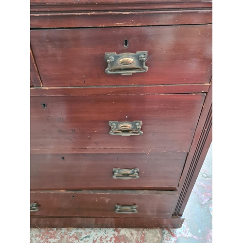 533 - An Edwardian mahogany chest of two short over three long drawers - measuring approx. 104cm high, 103... 