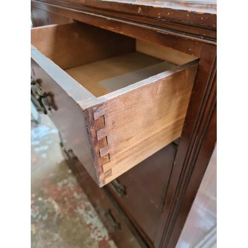 533 - An Edwardian mahogany chest of two short over three long drawers - measuring approx. 104cm high, 103... 