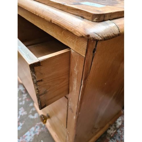 534 - A Victorian pine dog kennel sideboard with six outer drawers and one central drawer - 101cm high, 10... 