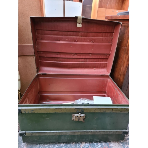 542 - A vintage green painted metal travel trunk - measuring approx. 74cm wide, 51cm deep and 44cm high