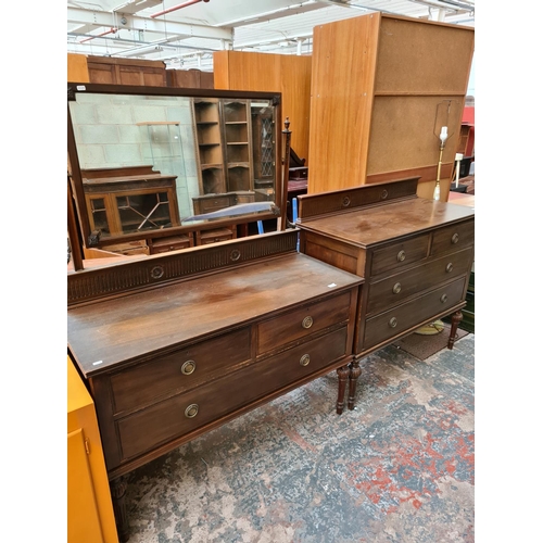 544 - An Edwardian carved mahogany two piece bedroom suite on reeded supports comprising dressing table wi... 