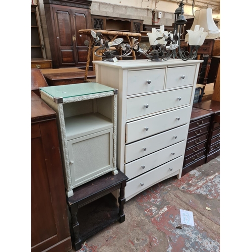 559 - Five items to include a white painted chest of two short over five long drawers, Lloyd Loom style gr... 