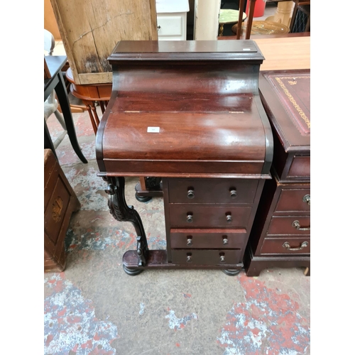 562 - A Victorian style mahogany davenport desk with red leather writing surface and four lower drawers (s... 