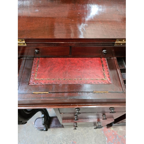 562 - A Victorian style mahogany davenport desk with red leather writing surface and four lower drawers (s... 