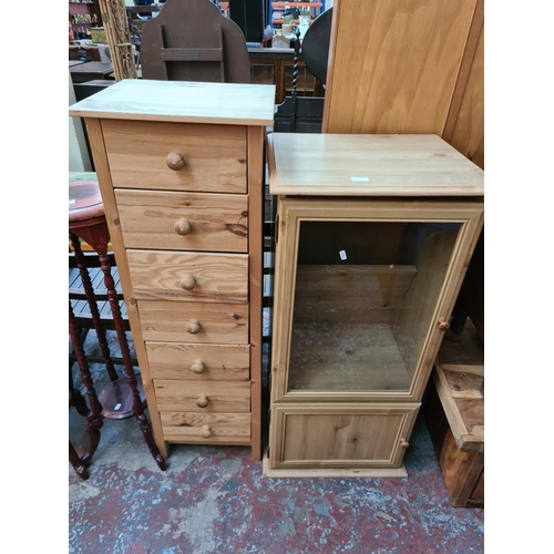 570 - Two items to include a pine effect media cabinet and a pine effect chest of seven drawers