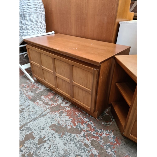 578 - Three pieces of Nathan teak furniture to include a bedside cabinet, hexagonal TV cabinet and a media... 