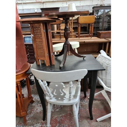 579 - Seven items to include a reproduction mahogany tripod wine table with green leather insert, Anglo In... 