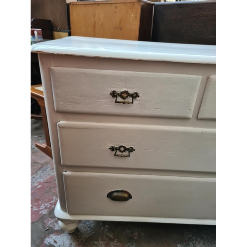 585 - An Edwardian white painted chest of two short over two long drawers - 81cm high, 96cm wide and 48cm ... 