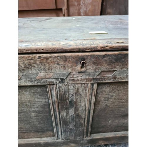 594 - An 18th century oak coffer - measuring approx. 54cm high, 94cm wide and 45cm deep (see condition rep... 