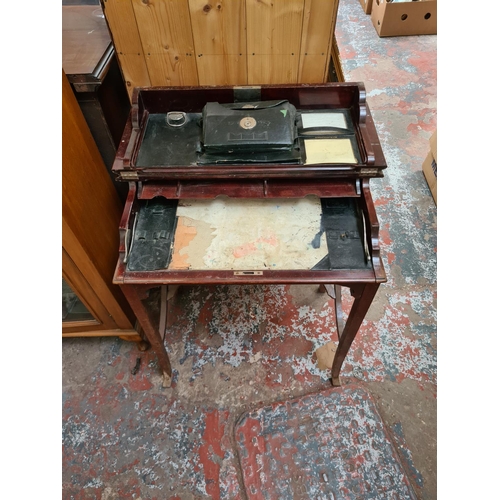 598 - An Edwardian mahogany concealed writing desk - measuring approx. 80cm high, 68cm wide and 44cm deep ... 