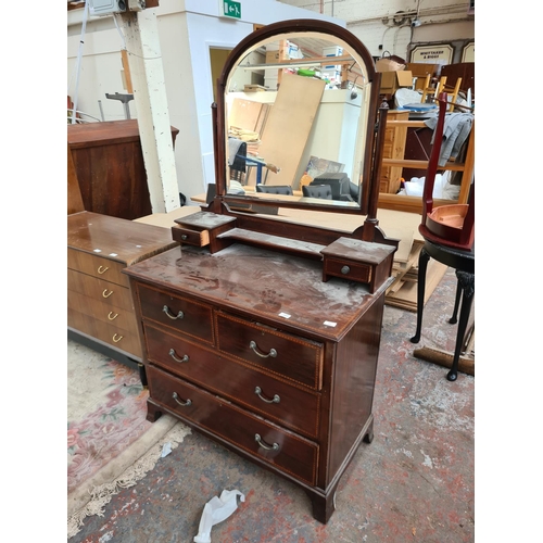 611 - An Edwardian inlaid mahogany dressing table with upper bevel edged mirror - measuring approx. 100cm ... 