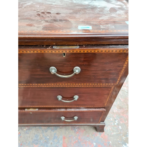 611 - An Edwardian inlaid mahogany dressing table with upper bevel edged mirror - measuring approx. 100cm ... 