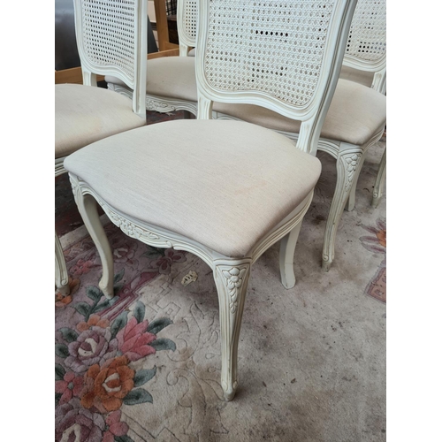 616 - Six French style white painted dining chairs with rattan backs and cream upholstery (see condition r... 