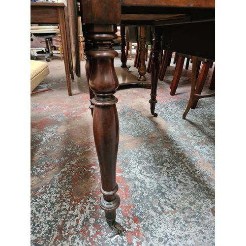 632 - A 19th century mahogany drop leaf occasional table