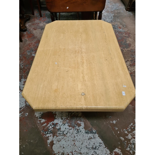 633 - A modern italian marble rectangular coffee table - measuring approx. 147cm in length, 97cm wide and ... 