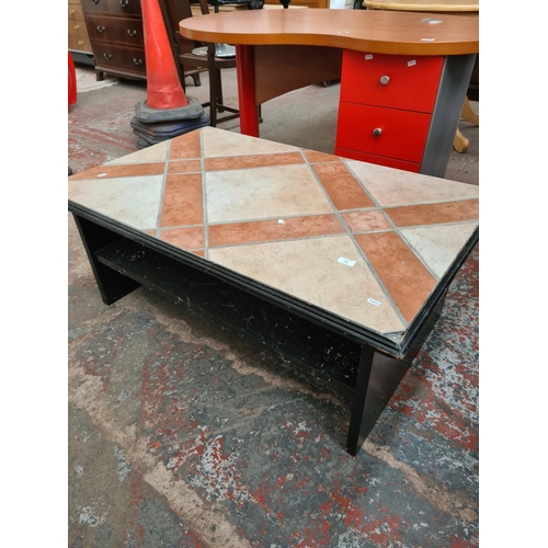 646 - A modern black ash and tile top rectangular coffee table (see condition report)