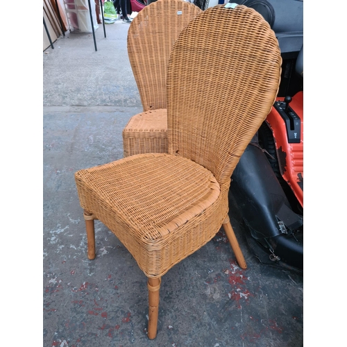 647 - Four wicker and cane dining chairs