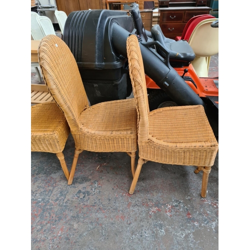 647 - Four wicker and cane dining chairs