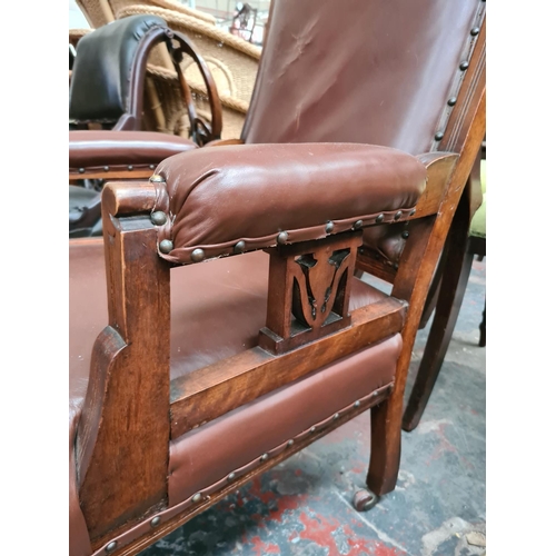 658 - An Edwardian oak framed parlour chair with brown leatherette upholstery - measuring approx. 106cm hi... 