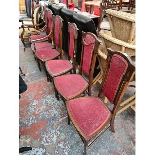 660 - Six Edwardian inlaid mahogany dining chairs to include two carvers (see condition report)