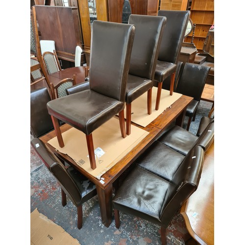 637 - Fourteen brown leatherette dining chairs (see condition report)