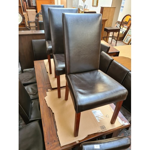 637 - Fourteen brown leatherette dining chairs (see condition report)