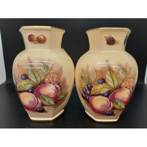 26 - A pair of Aynsley Orchard Gold hexagonal vases originally painted by D.Jones - measuring approx. 13c... 