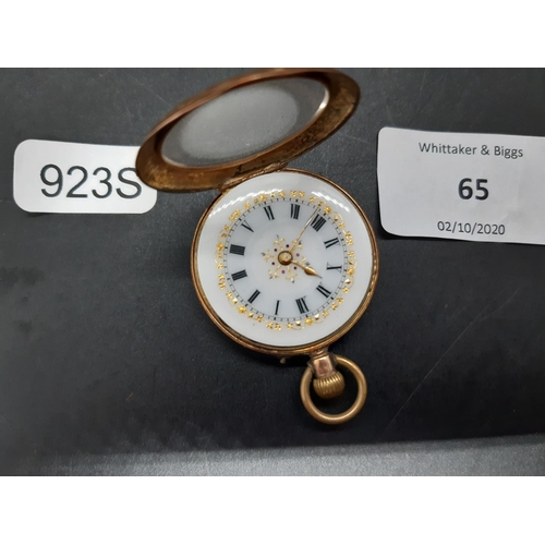 65 - A Cuivre hallmarked 14ct gold open face pocket watch with heavily engraved detail to case, white ena... 