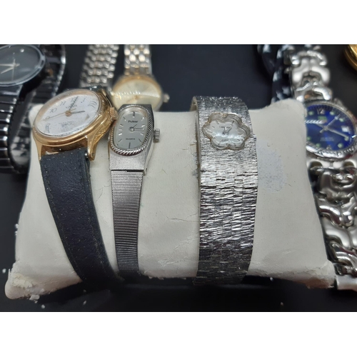 66 - Twenty two various ladies and mens fashion wristwatches