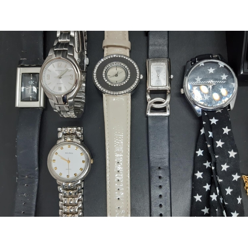 66 - Twenty two various ladies and mens fashion wristwatches