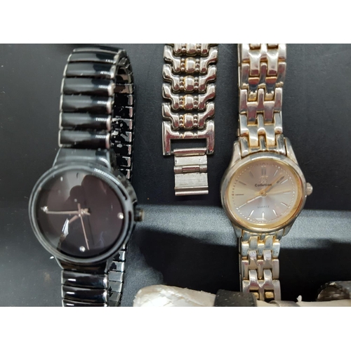 66 - Twenty two various ladies and mens fashion wristwatches