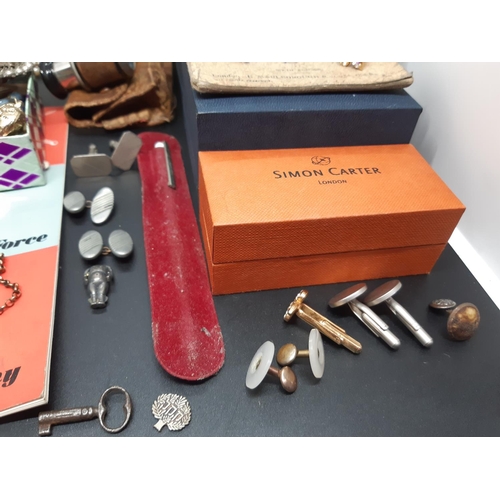 67 - A box containing various collectables and curios to include cut glass atomizers, cut glass perfume b... 