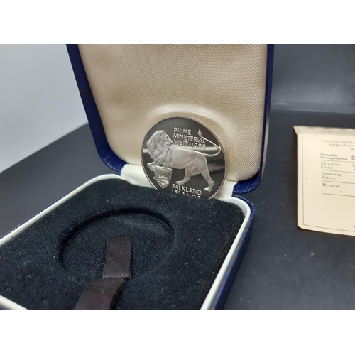 73 - Two items to include a cased Spink Prime Ministerial Visit 1983 Falkland Islands sterling silver com... 