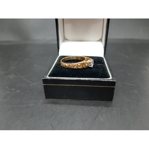 106 - A hallmarked 18ct gold solitaire diamond ring with sculptured band - approx. total weight 3 grams an... 