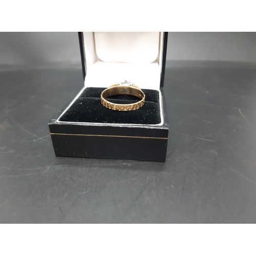 106 - A hallmarked 18ct gold solitaire diamond ring with sculptured band - approx. total weight 3 grams an... 