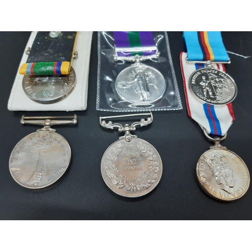 124 - Eight various medals to include two Cadet forces medals, Canal Zone copy medal, National Service med... 