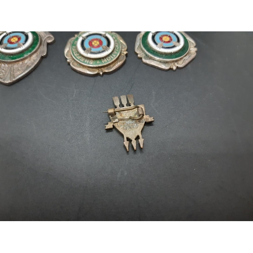 128 - Seven 1960s archery badges to include Sheffield Archery Association badge, N.C.A.S Sheffield badge e... 