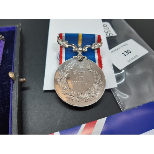 130 - Two items to include an early 20th century masonic presentation medallion presented to Brother Frede... 