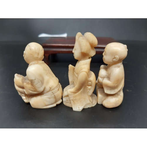 131 - Three Japanese carved netsuke figurines