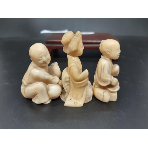 131 - Three Japanese carved netsuke figurines