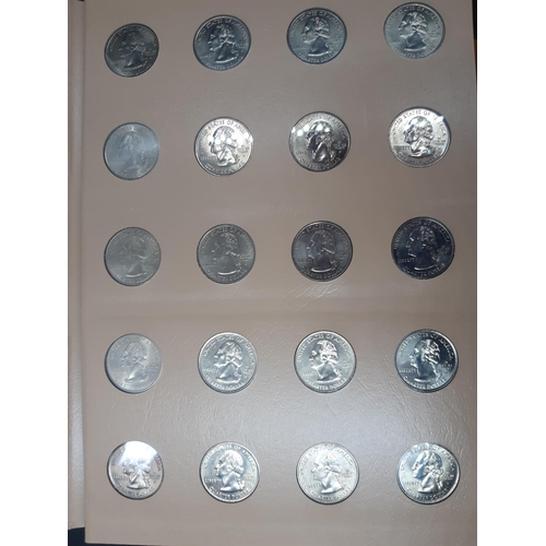 139 - A Dansco Archival slipcased coin album containing 100 Statehood commemorative quarters to include De... 