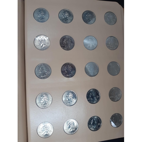 139 - A Dansco Archival slipcased coin album containing 100 Statehood commemorative quarters to include De... 