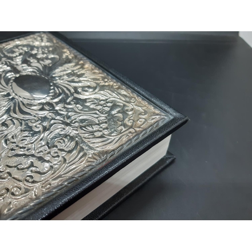 86 - A Little Oxford Dictionary with hallmarked Sheffield silver cover, repousse design and clear cartouc... 