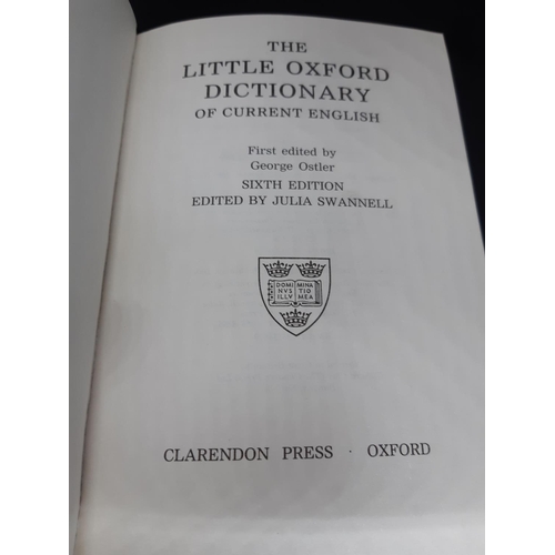 86 - A Little Oxford Dictionary with hallmarked Sheffield silver cover, repousse design and clear cartouc... 